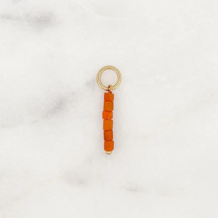 ORANGE STRING Charm